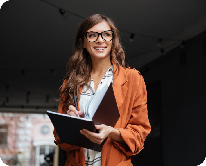 portrait-smiling-woman-making-notes